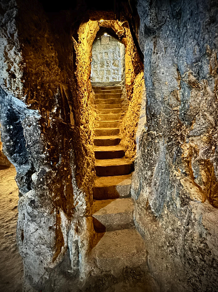 Narrow rock-cut corridor on the Derinkuyu Underground City route
